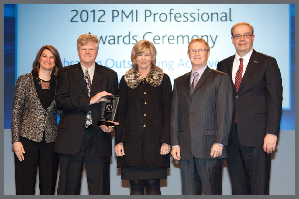 From the left, Deanna Landers, PMI Vice Chair; Dave Tillery, Fissure Developer; Lori Tillery, Fissure Developer;Jesse Freese, Fissure President; Peter Monkhouse, PMI Chair